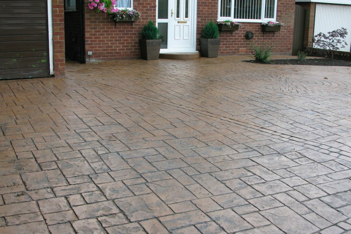 Stamped Concrete driveway stained Brown 
